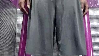 working out on the machine in the gym with my roommate