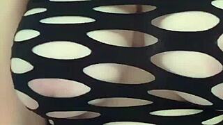 Why is this sexy MILF showing off her tits and ass?