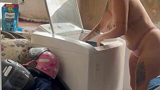 the neighbor hides while the woman washes clothes with her pussy and tits out freely