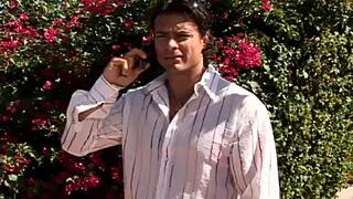 holly wellin grins and bares it all on bed