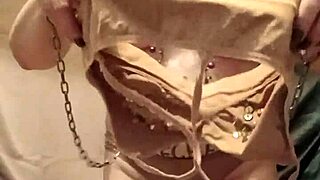 French slave teases with dildo outdoors