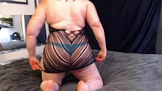 In a sexy dress and blue thong, I start with dirty talk and cum on a big black dildo