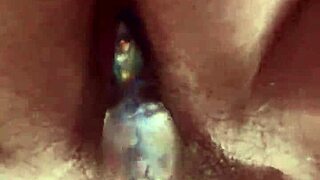 Tease your senses with up close hairy pussy glass dildo masturbation