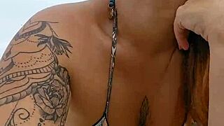 young african woman flashing on usa beach to attract attention