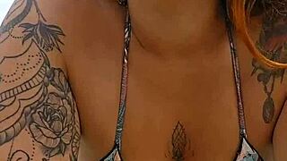 young african woman flashing on usa beach to attract attention