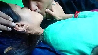 Kissing and pressing girlfriend's boobs