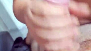 giving a handjob to a friend in an amateur teen video