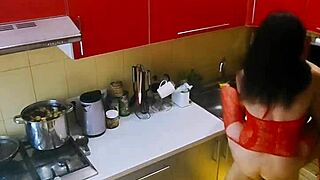 A couple films their home video with stockings