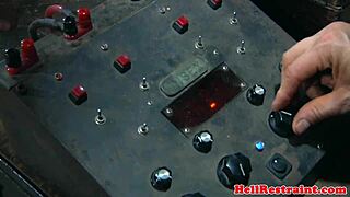 The mouth-gagged slut endures intense machine fucking with choking and domination.