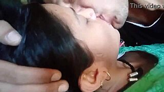 Kissing and pressing girlfriend's boobs