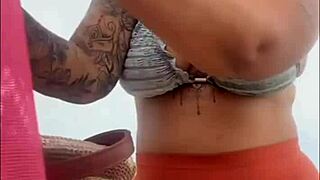 African woman flashes her swollen wet pussy on the beach ready for cock