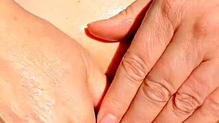 mature vibes fingers and spreads her bald cunt