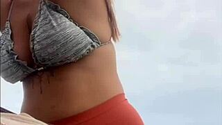 African woman flashes her swollen wet pussy on the beach ready for cock