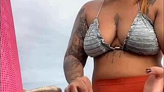 African woman flashes her swollen wet pussy on the beach ready for cock