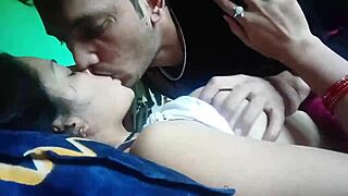 Kissing and pressing girlfriend's boobs