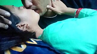 Kissing and pressing girlfriend's boobs