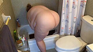 i watched this big juicy bbw milf in the shower showing her huge pussy lips and flashing her natural tits it was so wet
