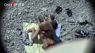 Curvy MILF flashes and gets fucked doggystyle on the beach. Who's watching?