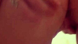 Chubby teen dances seductively while touching her shaved pussy in amateur video.