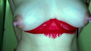 Milf mistress in red lingerie feeds lactating milk