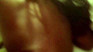 A detailed POV scene where an ebony side chick gets her pussy fucked intensely on the bed by a thick black cock.