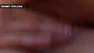 Chubby teen dances seductively while touching her shaved pussy in amateur video.