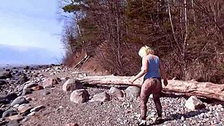 Wow, blonde milf's big ass in fishnet pantyhose on beach! It's so sexy.