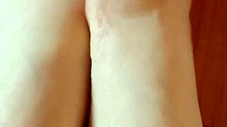 Greta has put beautiful nail polish on her toenails in her homemade video