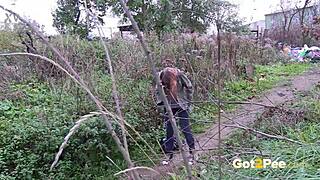 pretty girl pees in nature