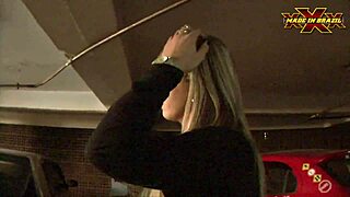 The driver gives a blowjob to the blonde pornstar in public, humiliating the cuckold.