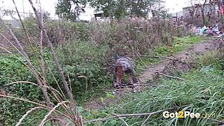pretty girl pees in nature