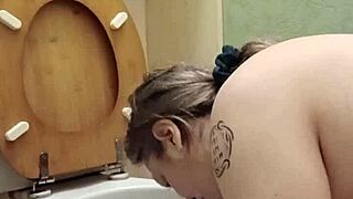 Humiliated slave flashes and drinks from toilet in outdoor session