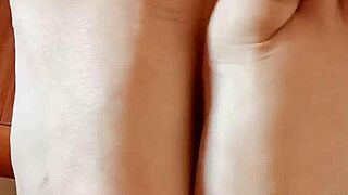 Greta has put beautiful nail polish on her toenails in her homemade video