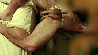 The solo gay guy tests a thrusting dildo in his ass