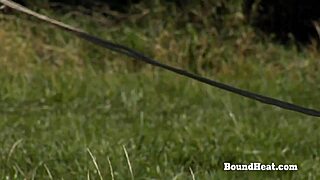 lesbian slave bends over for spanking and fingering by horny madame