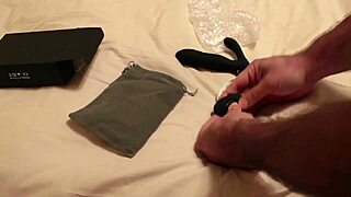 The solo gay guy tests a thrusting dildo in his ass