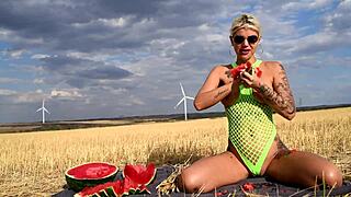 Juicy Blonde Performs Deepthroat Blowjob Outdoors with Cum Swapping