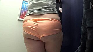 the camera in the fitting room watches a big ass in satin panties curvy milf changes clothes pawg amateur fetish