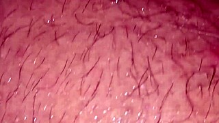 Ansima moans while spitting on big cock during intense handjob.