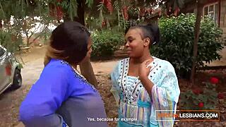 African milf lesbians make out in public during house party.