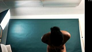 exotic hottie poses wide open for photographer in photoshoot