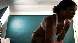 exotic hottie poses wide open for photographer in photoshoot