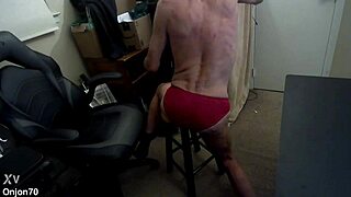 Grinding Stretch on Stool in Red Briefs for Pelvic Pain Relief