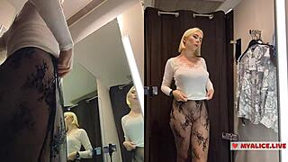 spying on busty girl trying transparent clothes in dressing room