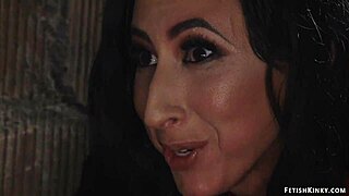 Femdom in latex pegging masked man