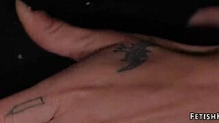 Femdom in latex pegging masked man