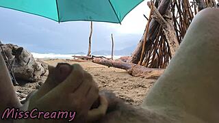 misscreamy handjobs my cock on the stormy beach. voyeur 4k.