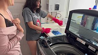Two lesbians having silent sex in the kitchen