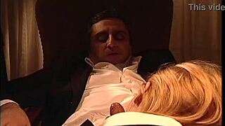 Jasmine Rouge gives a teasing blowjob under the desk to the mafia boss, swallowing his cum.