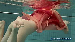 katya okuneva bathes in red dress at pool